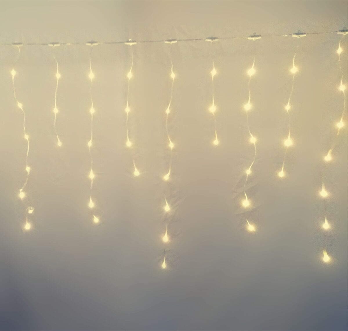 LED Icicle Light String Warm White Bedroom Curtain Lights Waterproof,Battery or Solar Powered,8 Lighting Modes,Indoor Outdoor House Deck Fence Garden Patio Decorative Lights(9.8ft 150LEDs)