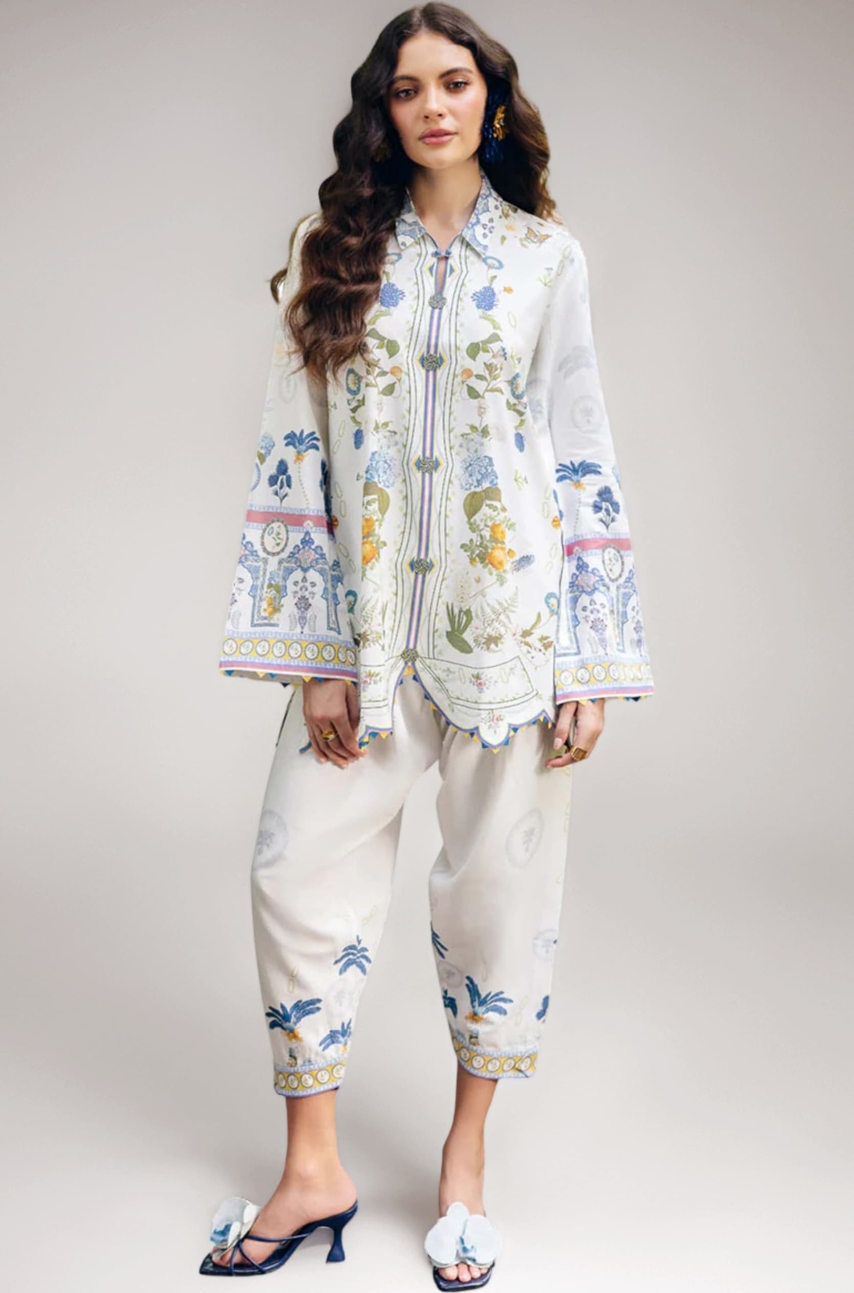 Modestouze Attires Women's Pattern Rayon Kurta Pant Set with Flare Long Sleeve Collared Neck Hip Length and Pull On Closure Type